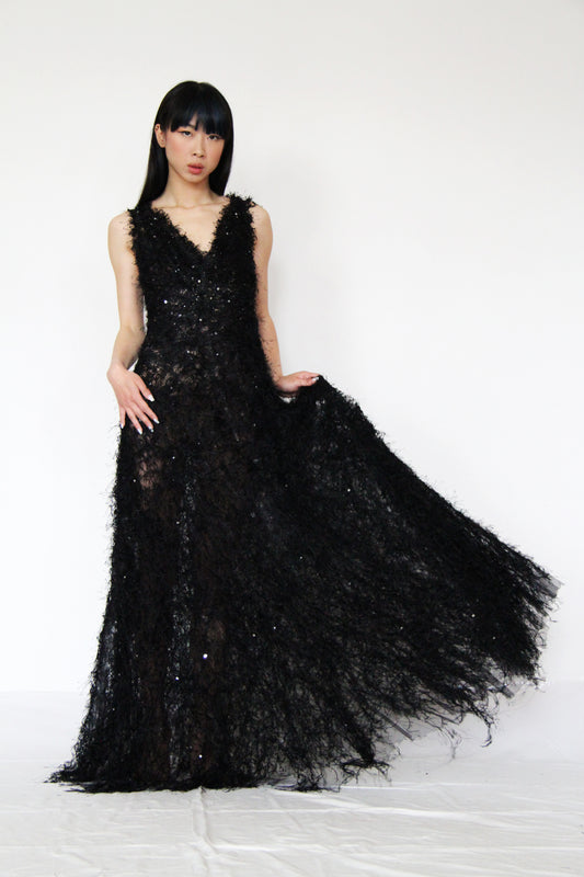 Abito lungo morbido con paillettes