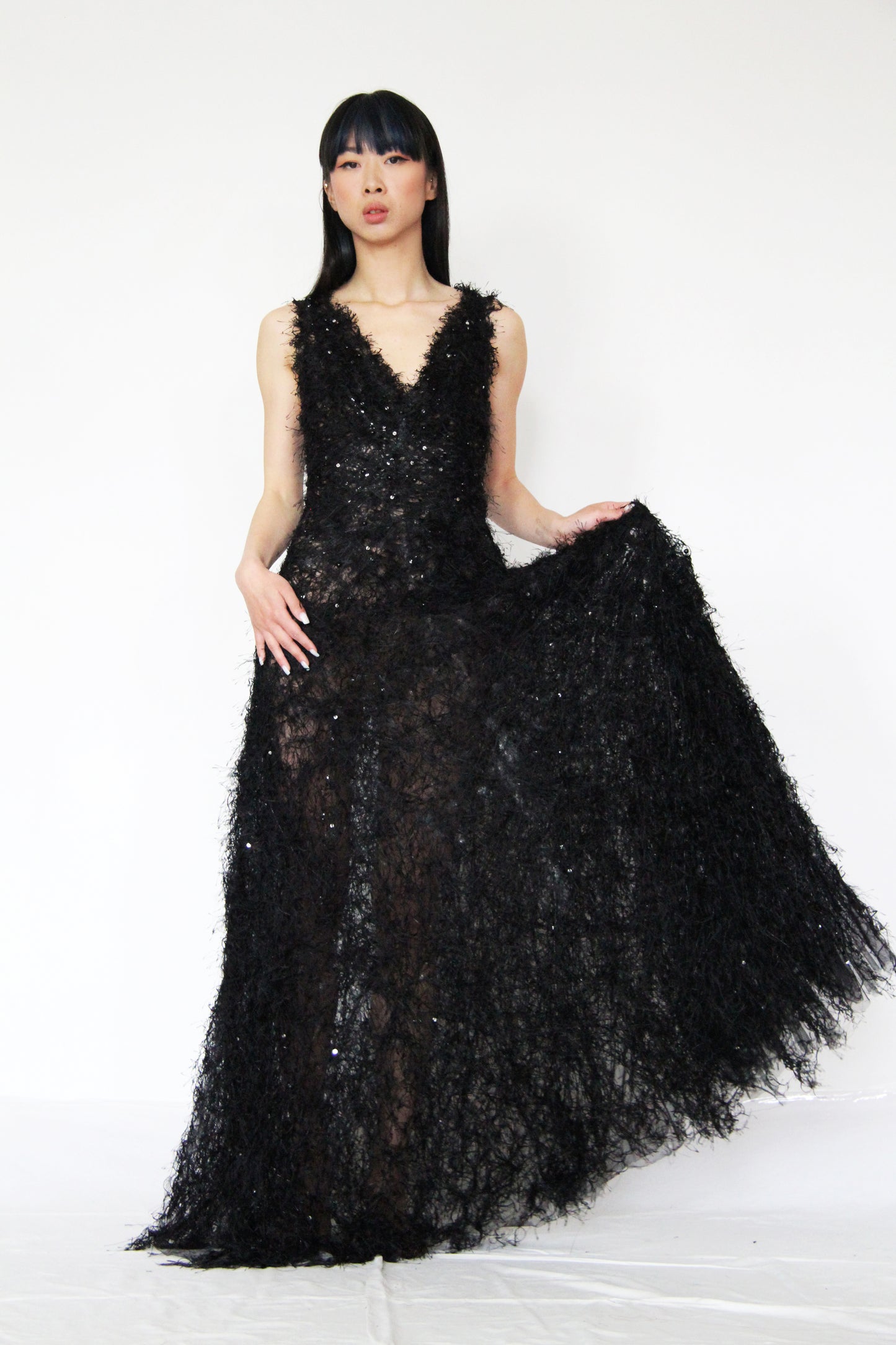 Abito lungo morbido con paillettes