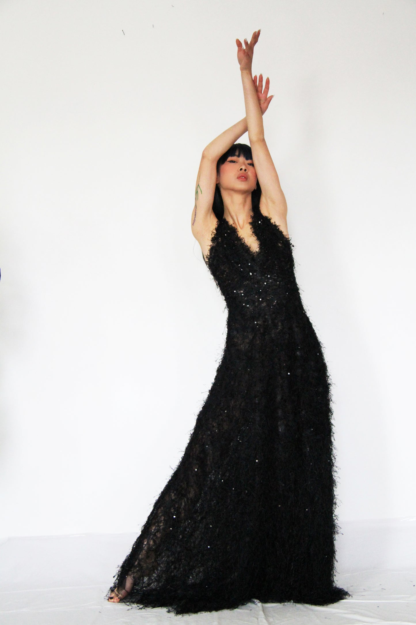 Abito lungo morbido con paillettes